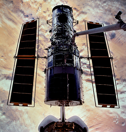 Space Shuttle Columbia docked with the Hubble Space Telescope (2002) Space Shuttle Columbia docked with the Hubble Space Telescope (2002)